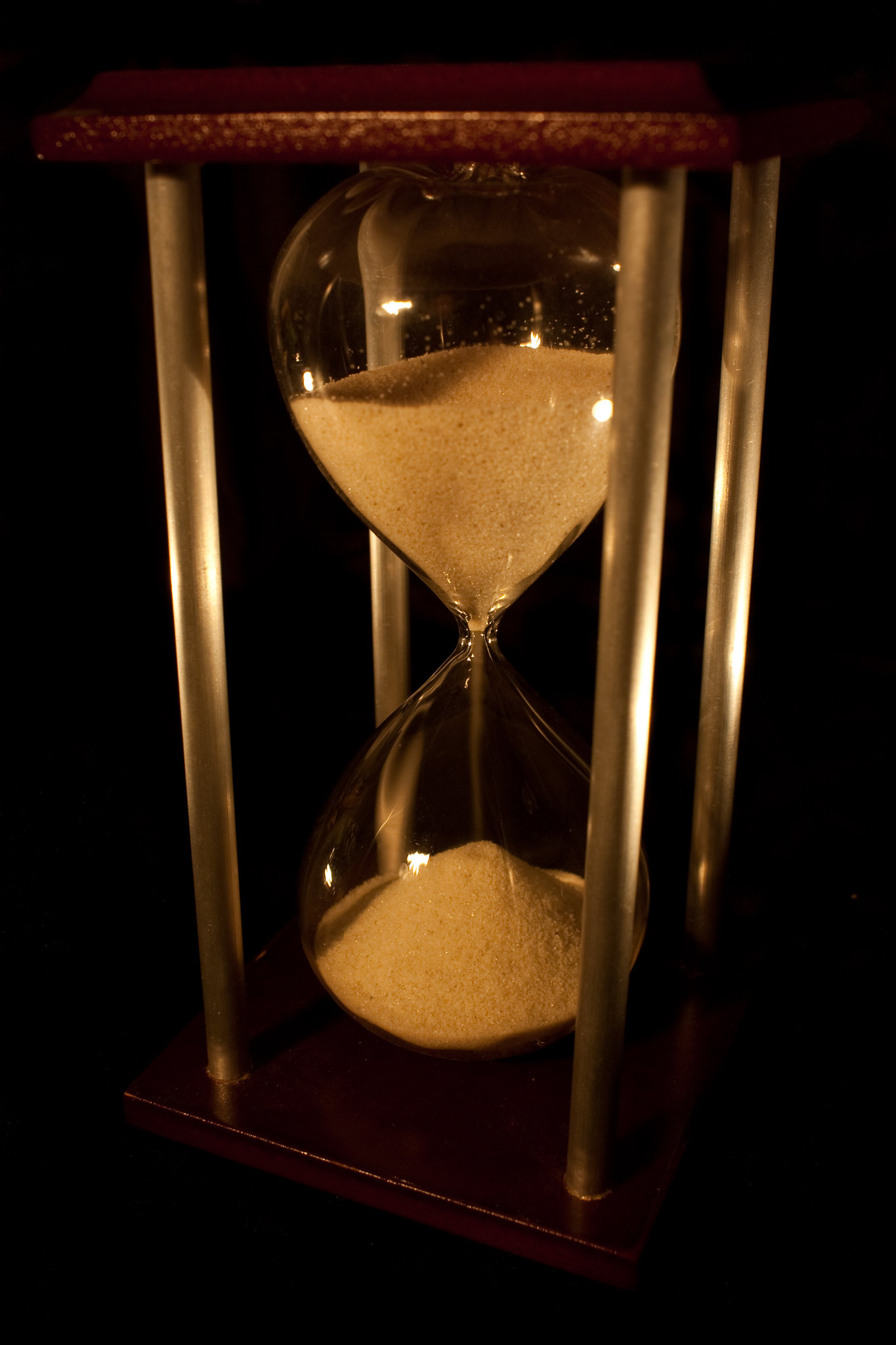An hourglass with sand running through it