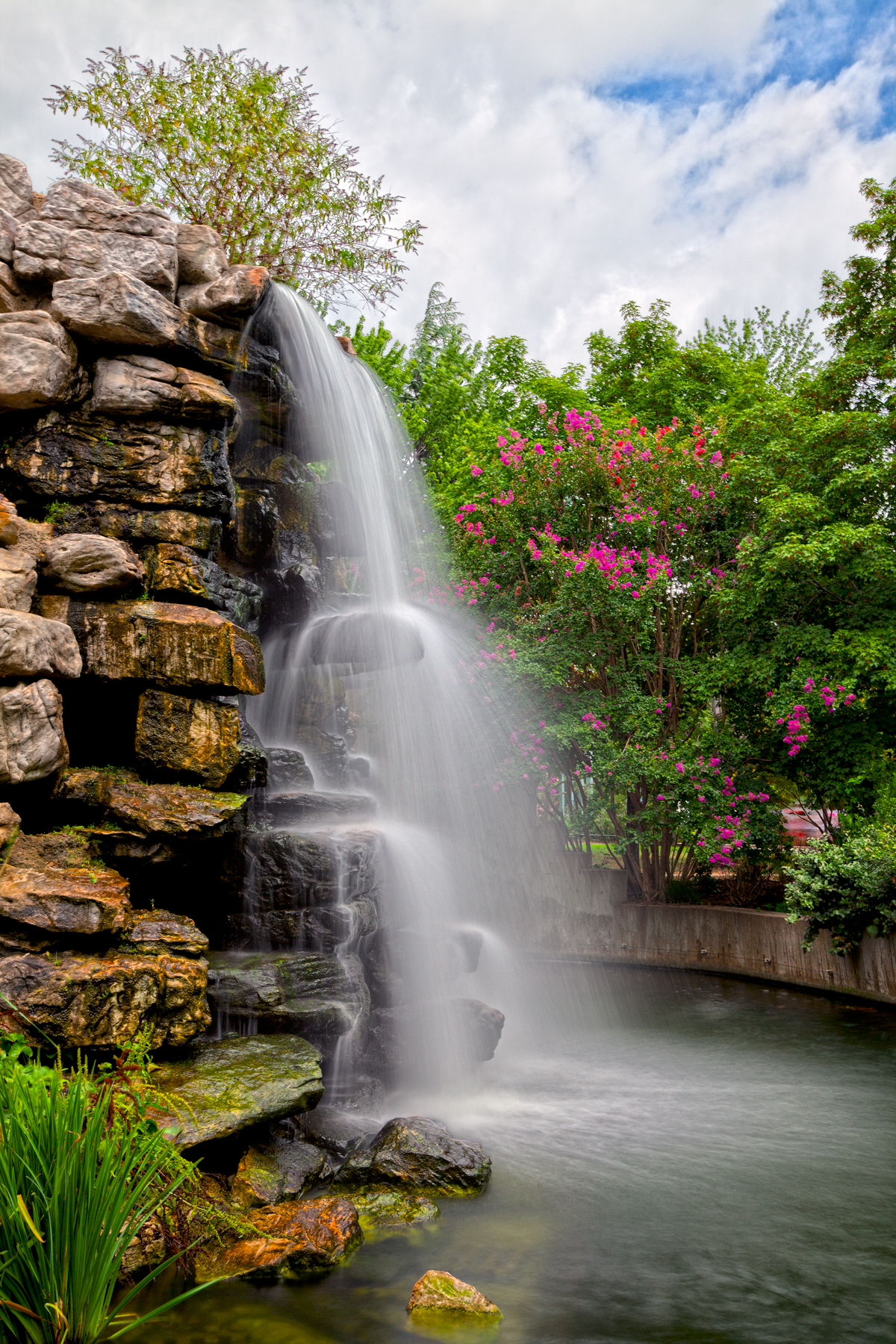 Waterfall cascading over rocks, a visual metaphor for how inhibition cascades into other executive functions